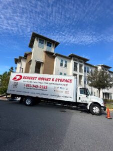 Bereket Moving truck with Florida license parked in front of Tampa home
