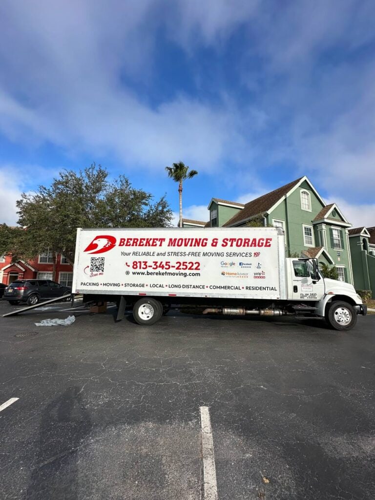 Bereket Moving truck parked outside a home in Largo during a move