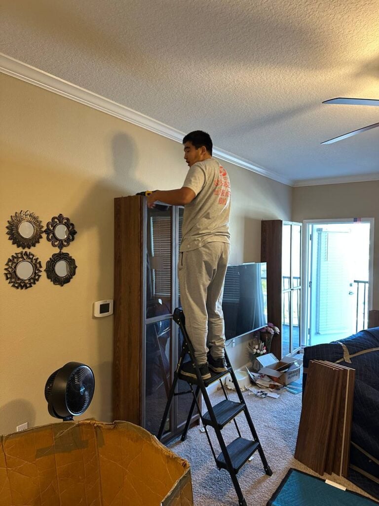 Bereket movers loading furniture and boxes during a move in Clearwater