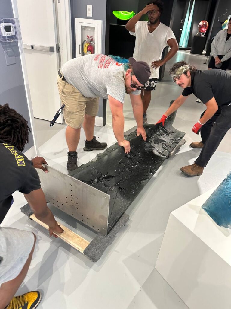 Bereket Moving team carrying 1000 lbs glass